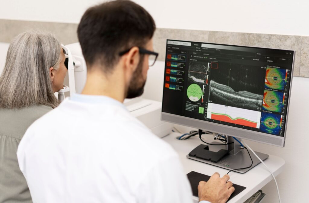 An optometrist uses advanced technology to examine a patient's eye structure for diseases.