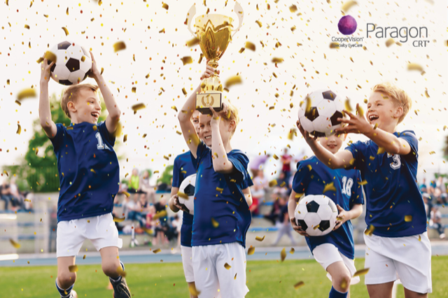 A children's soccer team winning a tournament